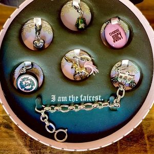 Juicy Couture, “I am the Fairest”charm bracelet.